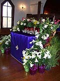 We purchase the flowers and decorate the Tomb.